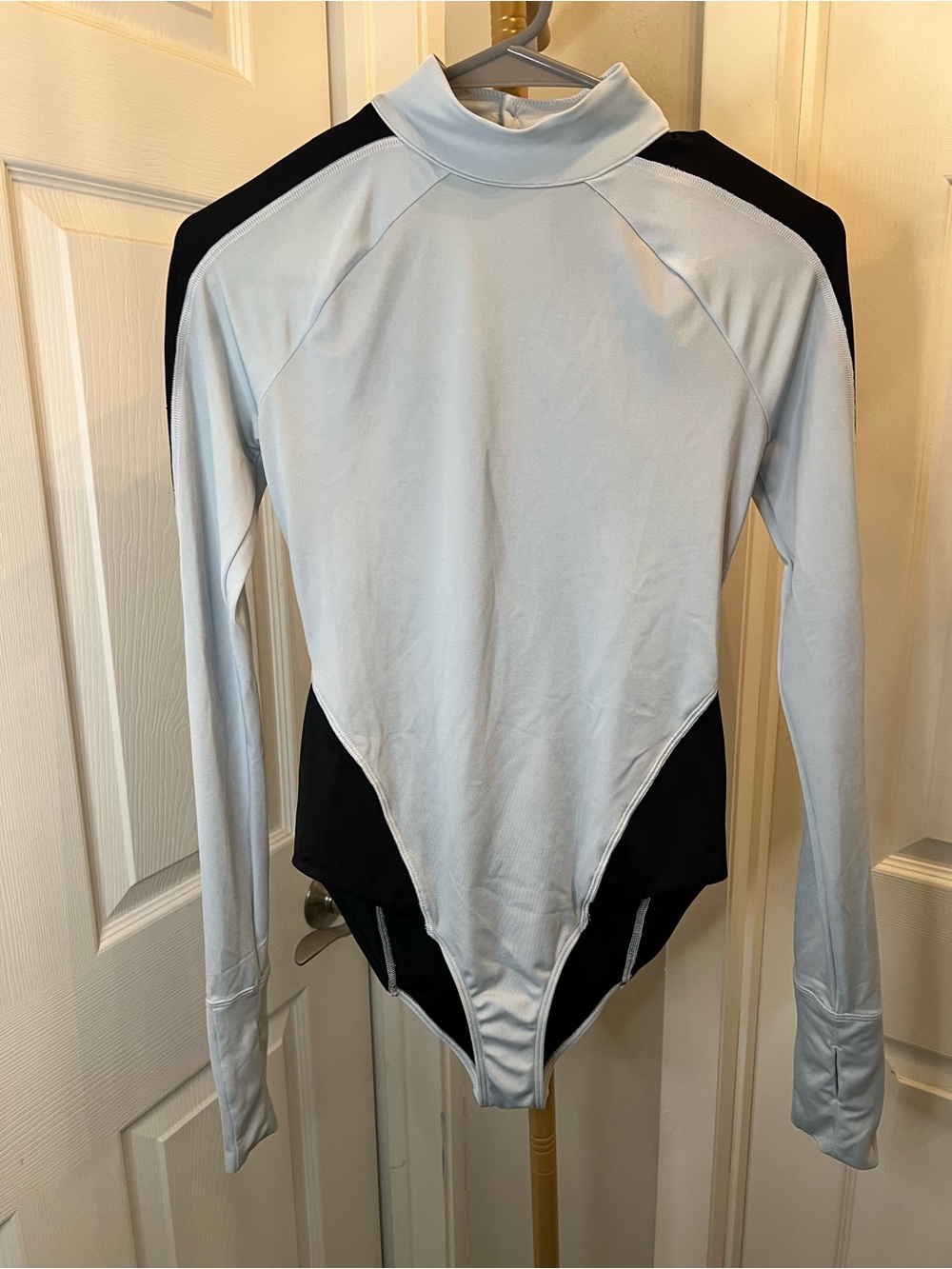 WE ARE Logo Black Long Sleeve swimsuit with Light Blue Stitching
